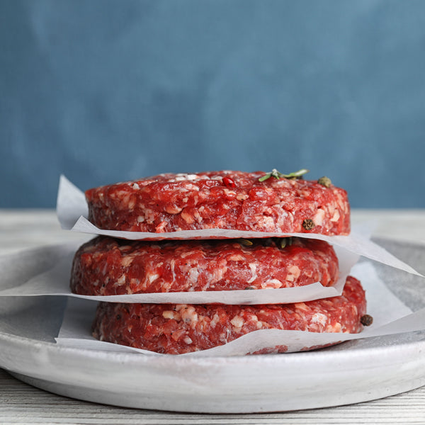 Quick Frozen un-aged grass fed beef & herb burgers, (additive free, gluten free, quick frozen)