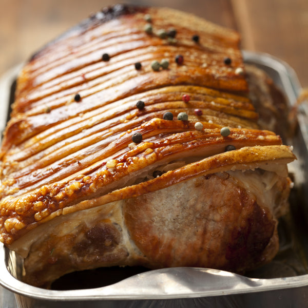 Unaged, quick frozen pasture raised free range pork loin roast on the bone with crackling